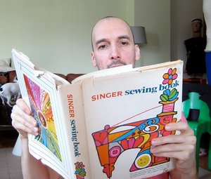 Studying_sewing_book_medium
