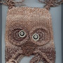 Crosseyed_owl_large