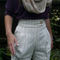 Laura_shorts_close_up_grid