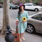 Cathy_with_flower_and_guitar_grid