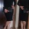 Black_leather_clutch_with_a_bow_3_grid