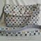 Sling_bag_in_charming_copy_grid