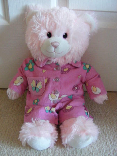 teddy bear wearing pyjamas