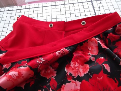 Button_on_peplum_2_large