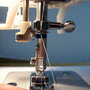 Twin_needle_threading_the_needles_thumb
